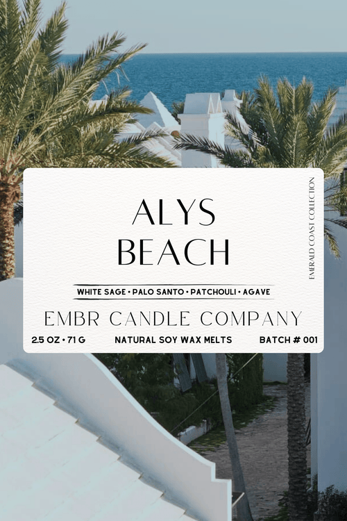 Close-up of Alys Beach Soy Wax Melt label showing white sage, palo santo, patchouli & agave scent blend, part of the Emerald Coast Collection.